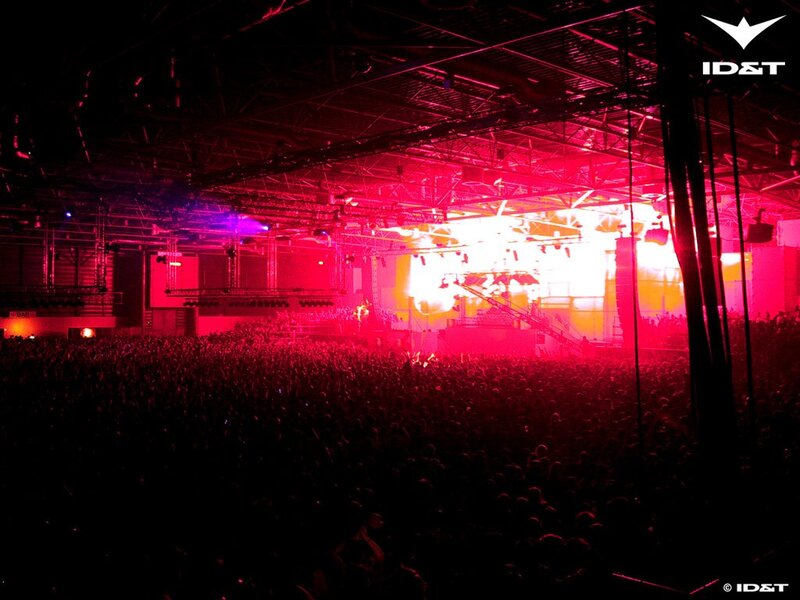 concert crowd under red lights