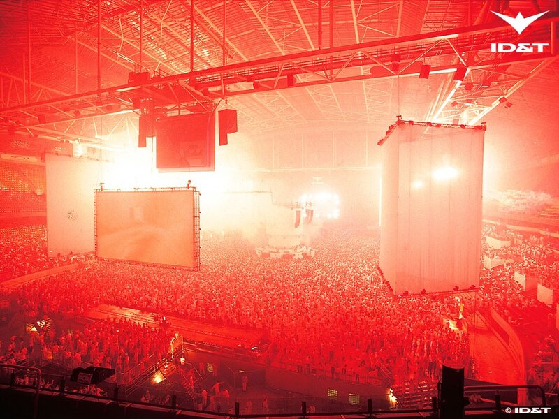 Concert crowd under red lights