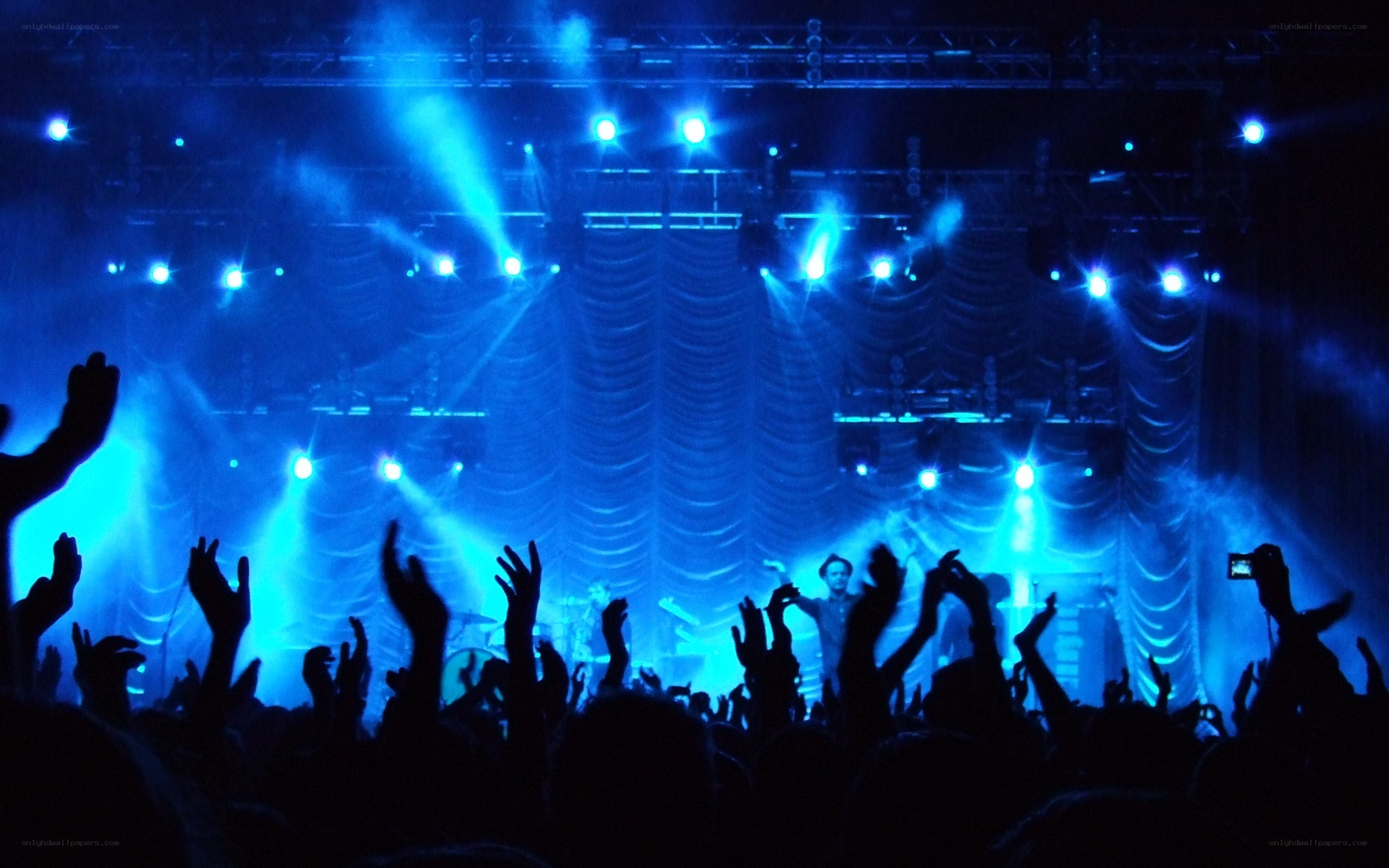 concert crowd with blue lights