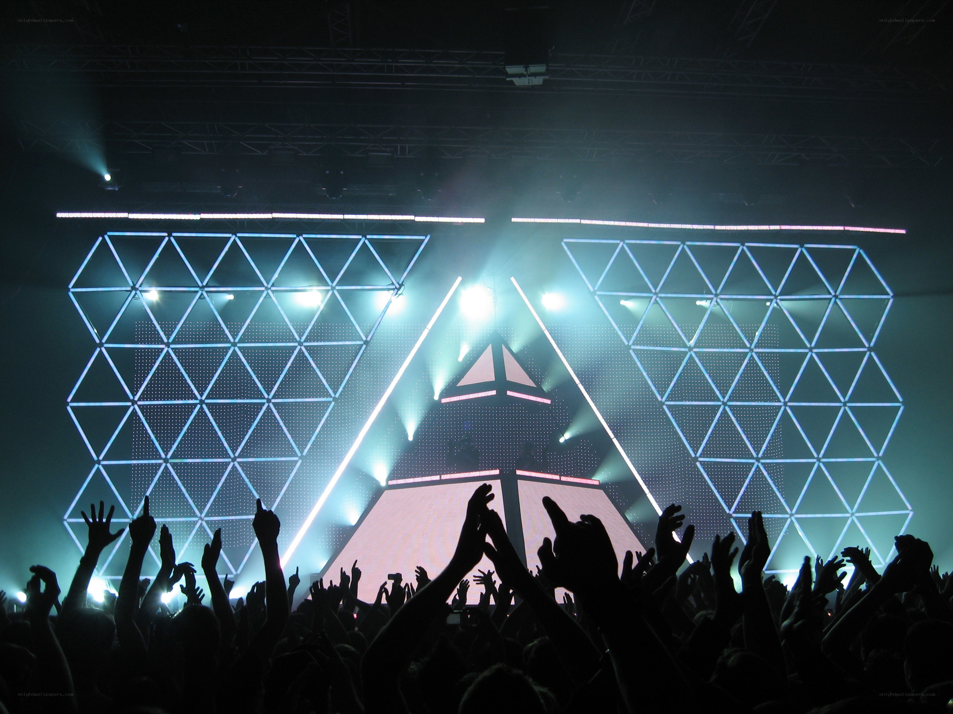 Concert crowd with geometric stage