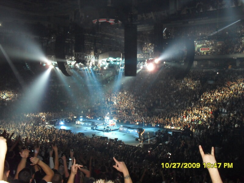 concert crowd with hands up