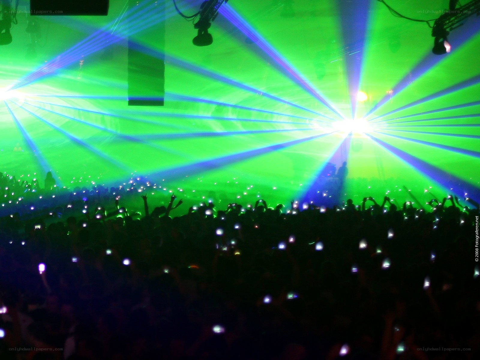 Concert crowd with laser lights