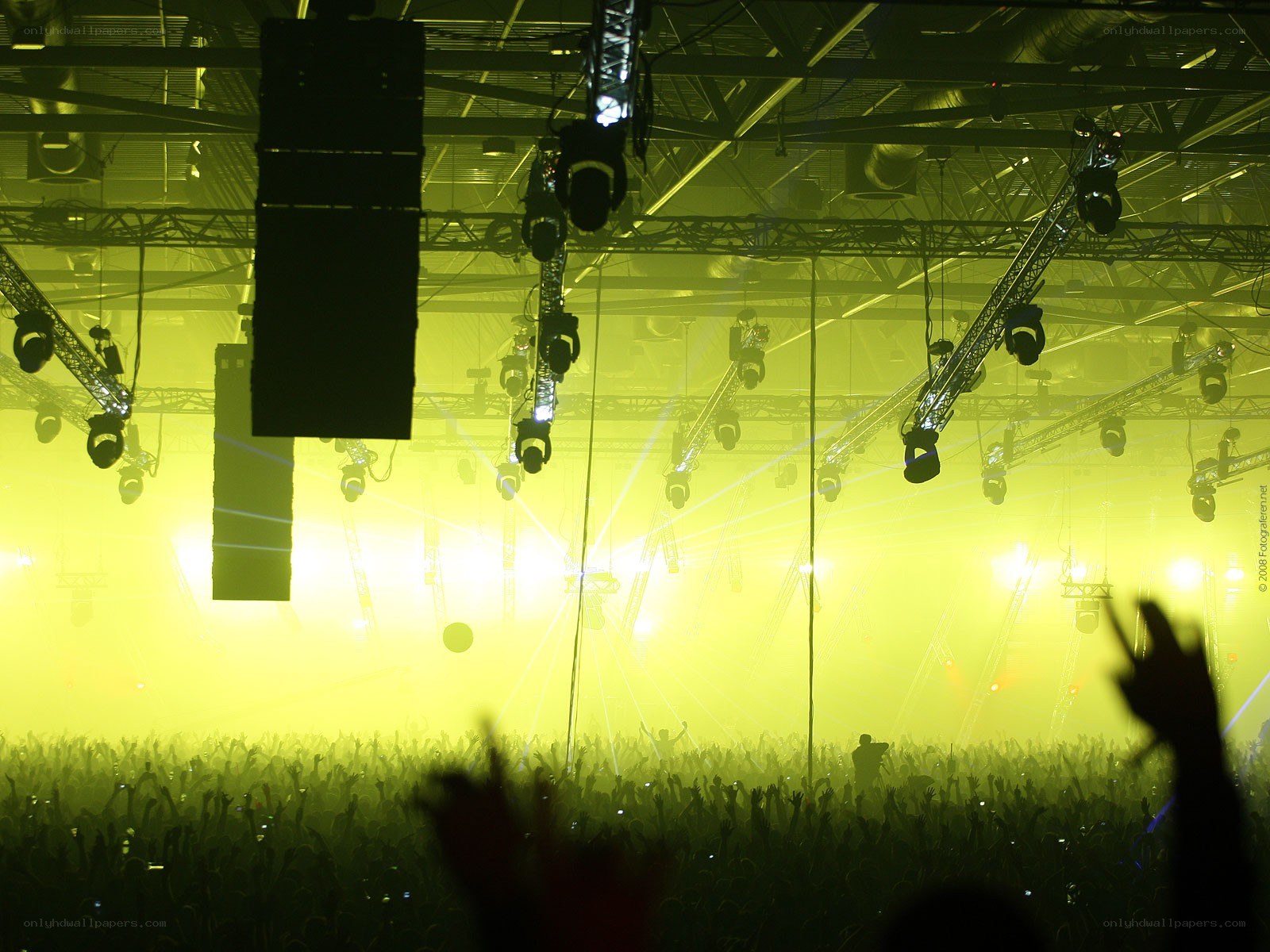 Concert crowd with yellow lights