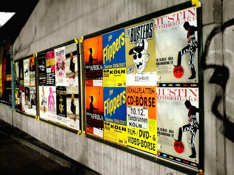 concert posters on a wall