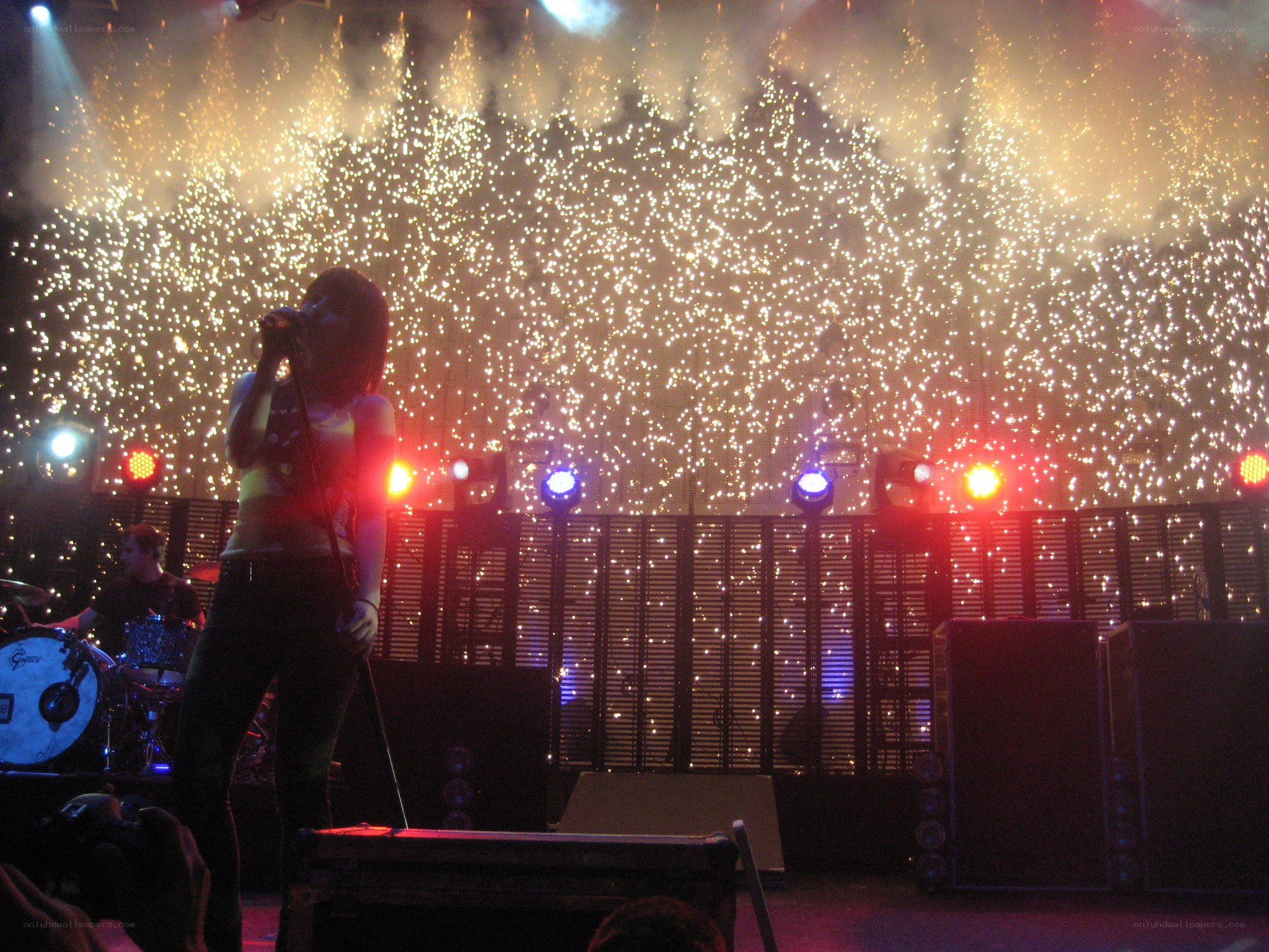 concert with sparkler backdrop