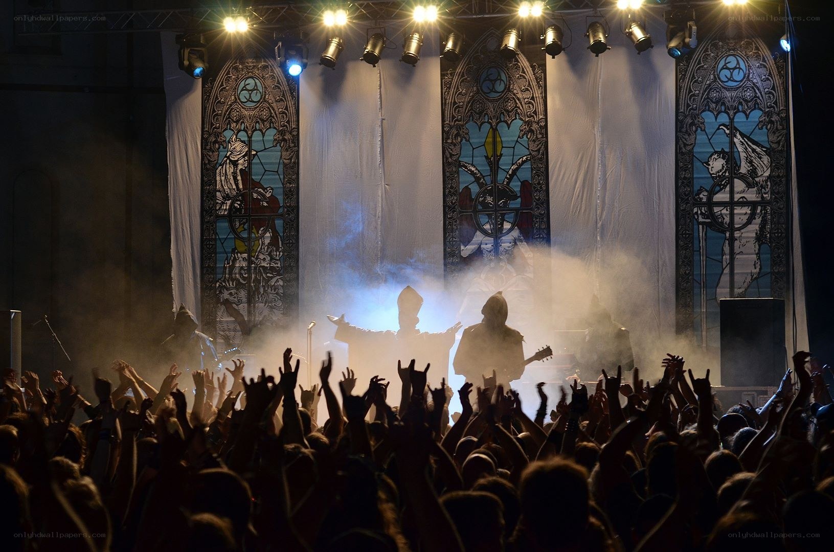 concert with stained glass backdrop