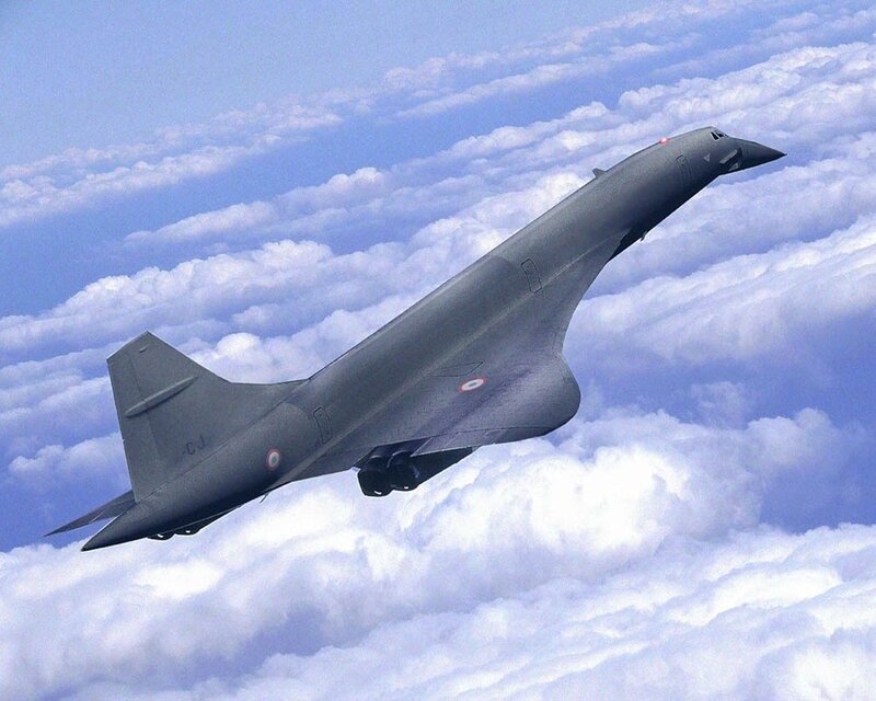 Concorde in flight above clouds