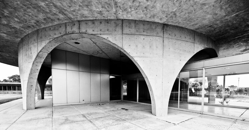 Concrete arches at building entrance