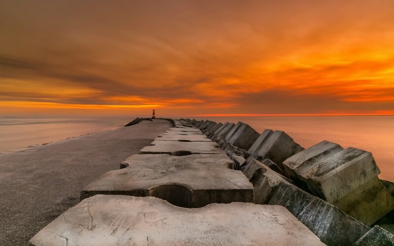 Concrete Breakwater at Sunset