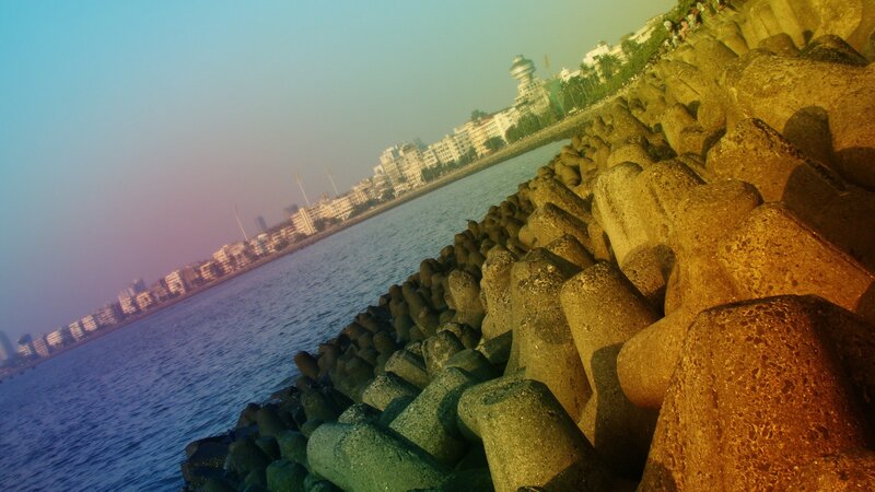 Concrete Breakwaters at Sunset — Blue, Serene