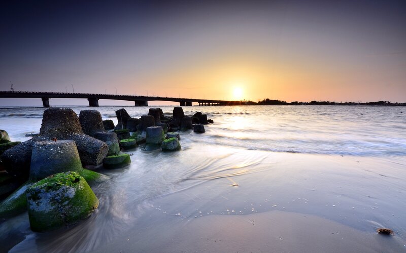 Concrete Breakwaters at Sunset — Blue