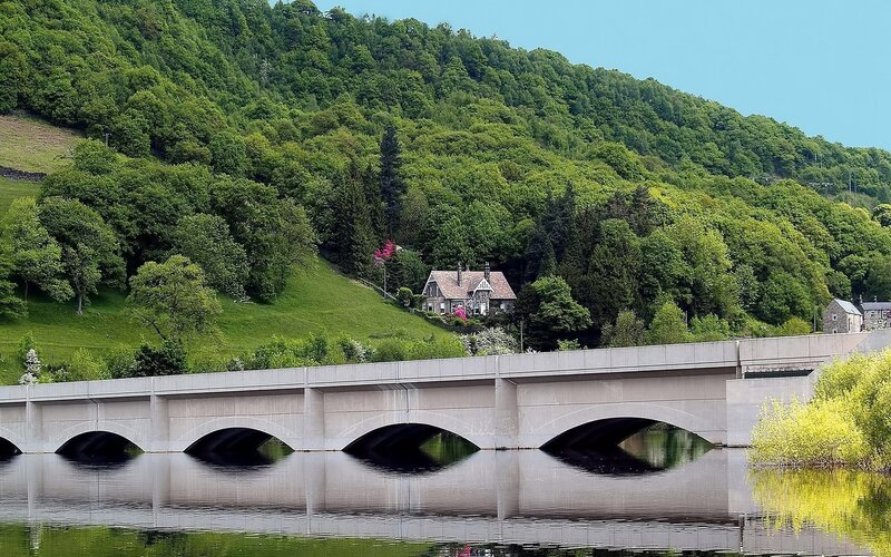 Concrete Bridge over River — Green, Serene, Afternoon, Photograph, Hillside, House