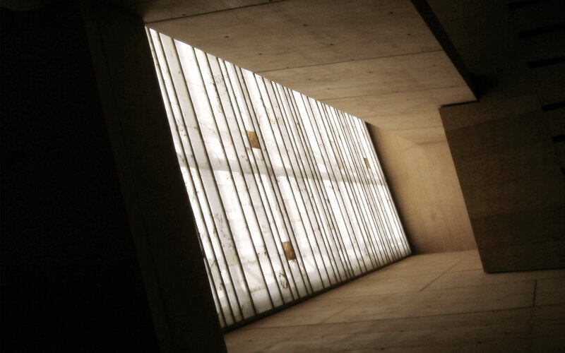 Concrete corridor with light panels