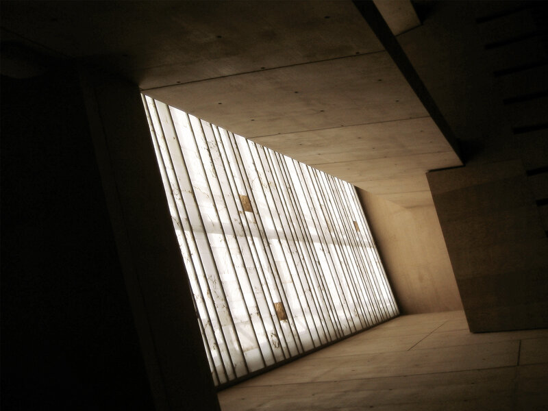 Concrete corridor with light wall