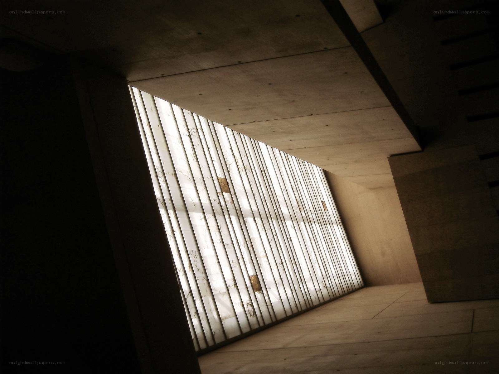Concrete corridor with light wall