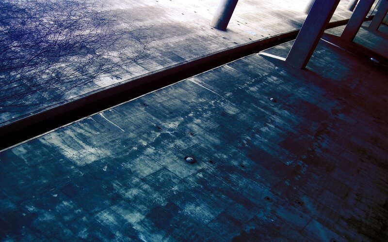 Concrete floor with tree shadows