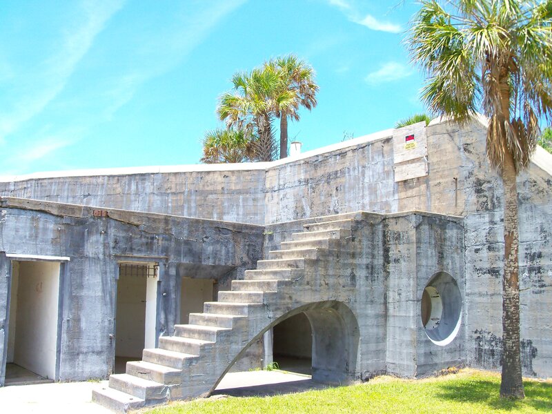 concrete fort with palm trees