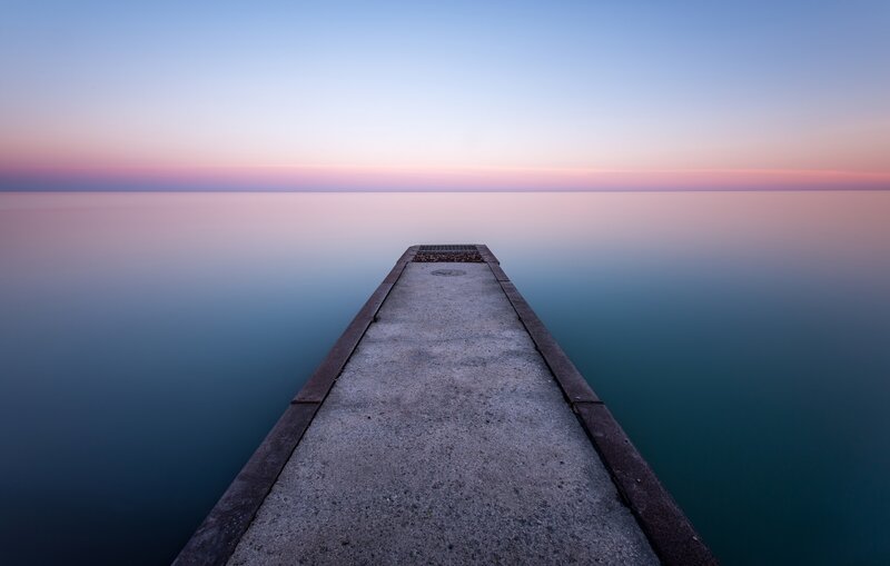Concrete Pier at Sunset — Blue, Serene