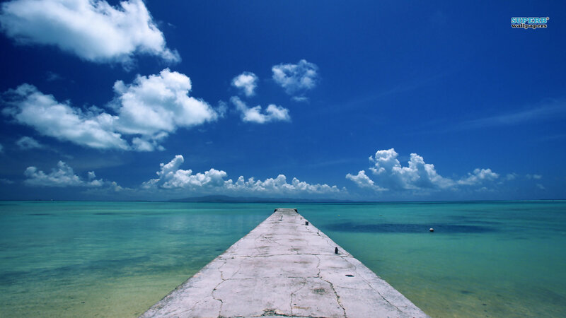 Concrete Pier Extending into Sea — Blue, Serene, Afternoon