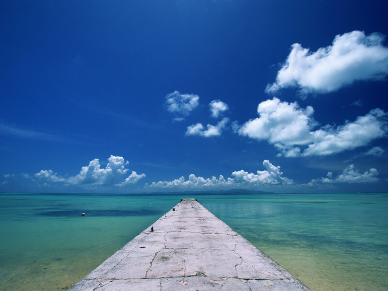 Concrete Pier Extending into Sea
