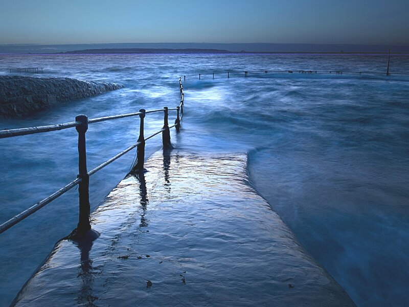 Concrete Pier in Ocean — Blue, Serene