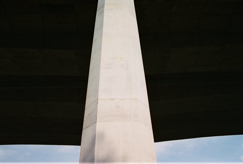 concrete pillar under bridge