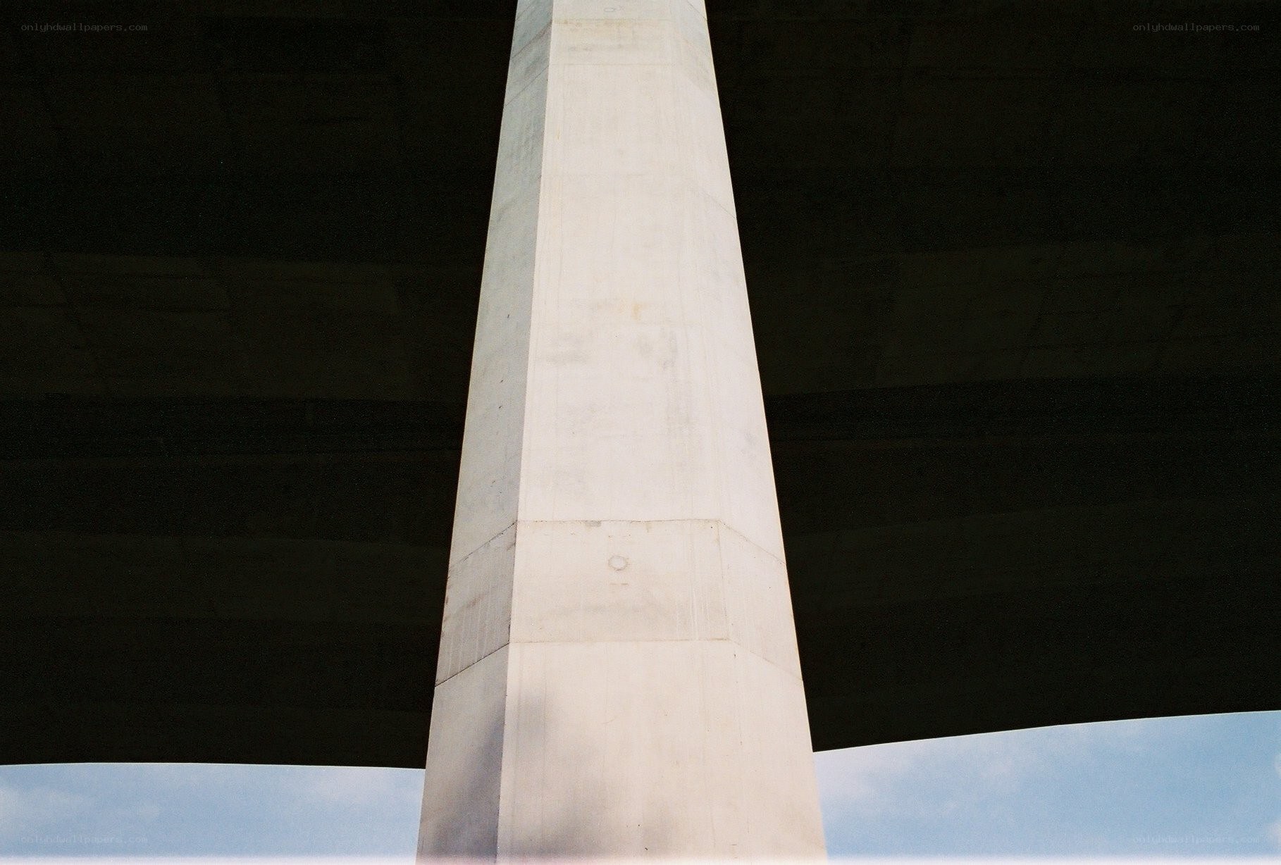 concrete pillar under bridge
