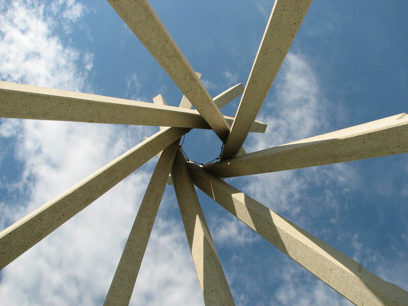 Concrete sculpture against blue sky