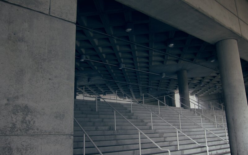 Concrete staircase under overpass