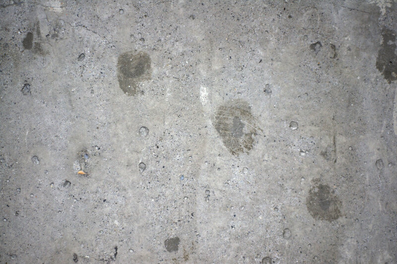 concrete surface with stains