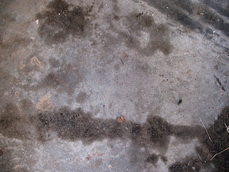 concrete surface with stains