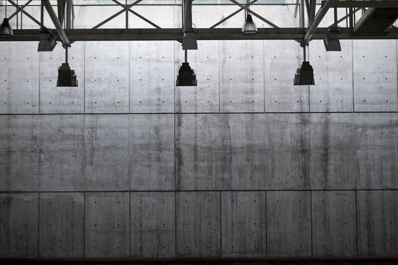 concrete wall with hanging lights