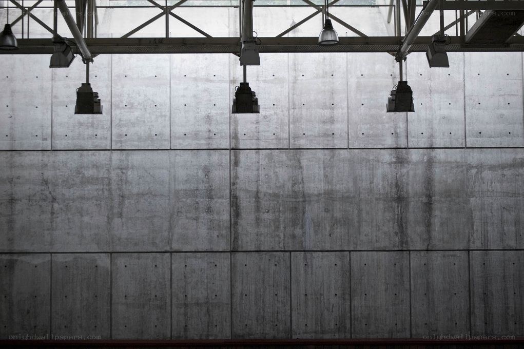 concrete wall with hanging lights
