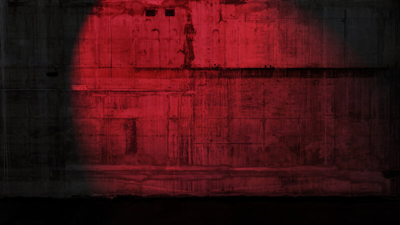 Concrete Wall with Red Light