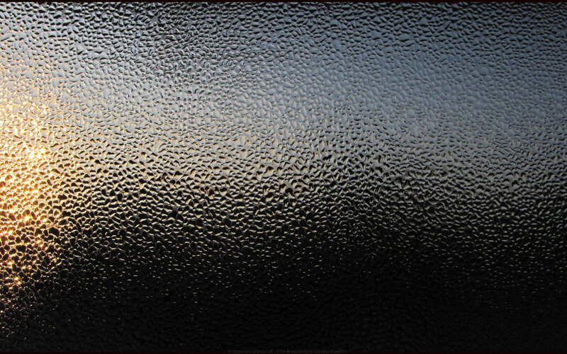 condensation on glass with sunlight