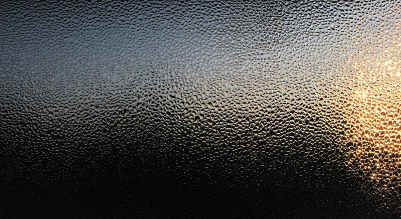 condensation on glass with sunlight