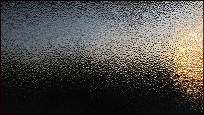 condensation on glass with sunlight