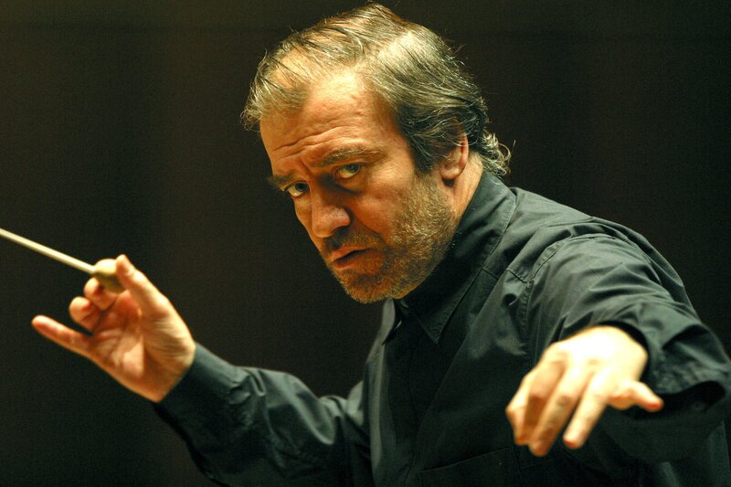 Conductor conducting an orchestra