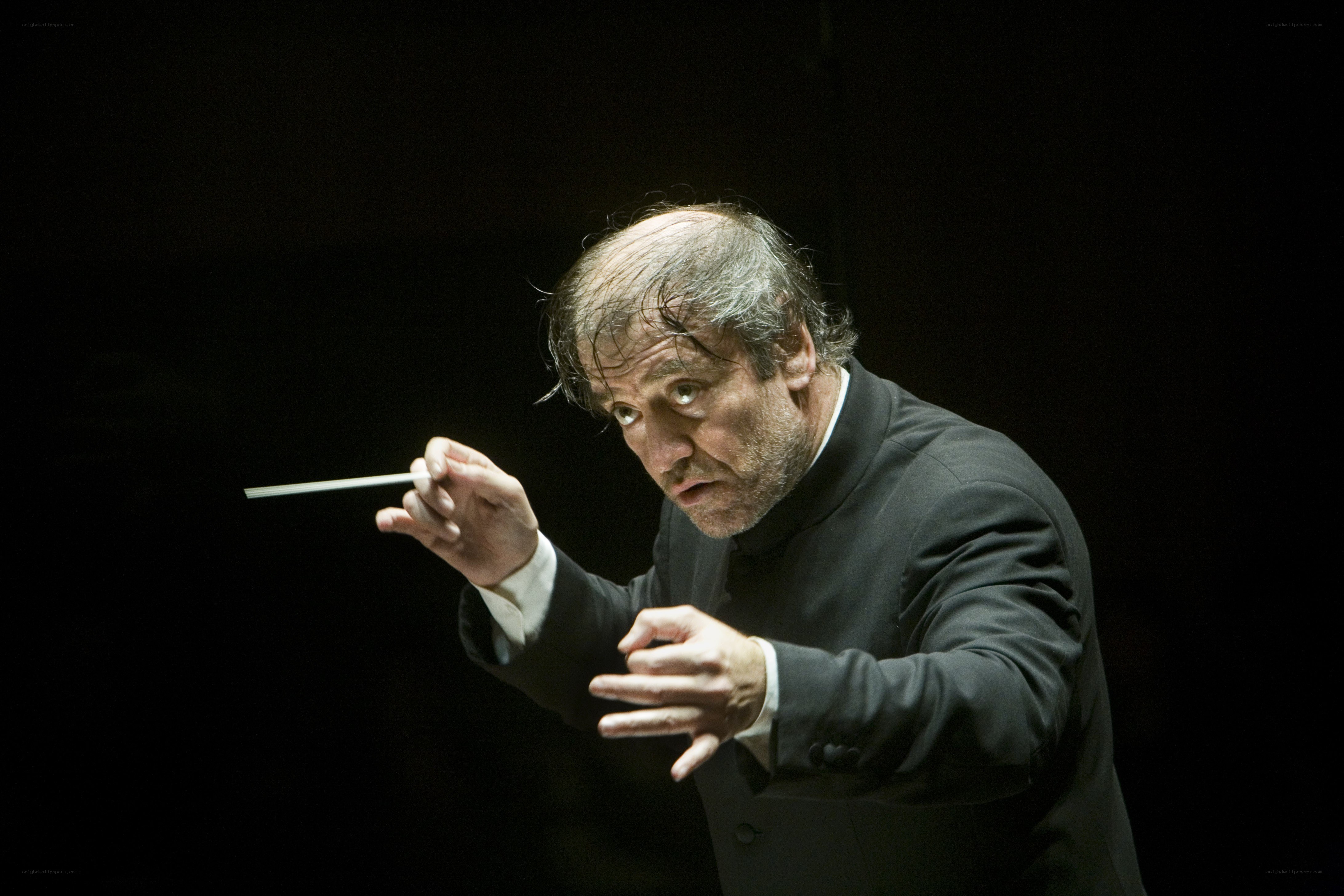 Conductor conducting orchestra