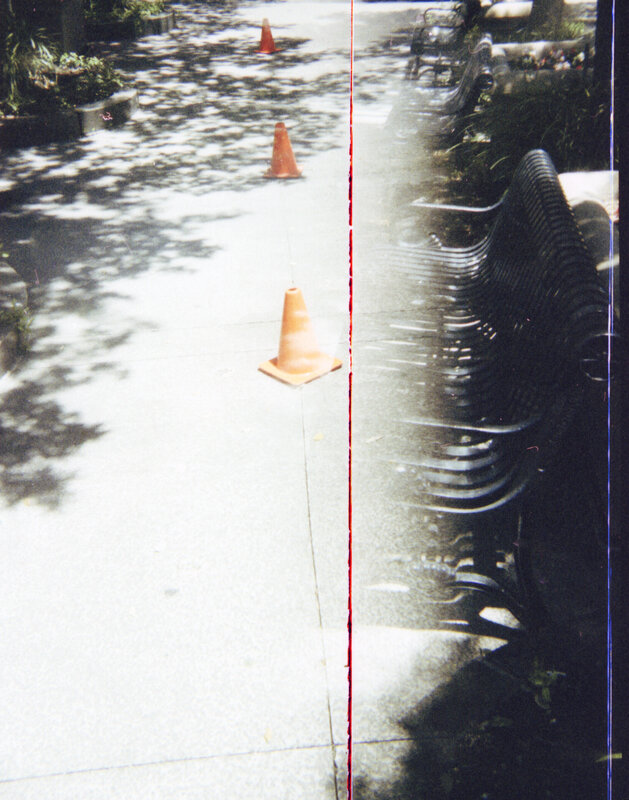 cones on a sidewalk