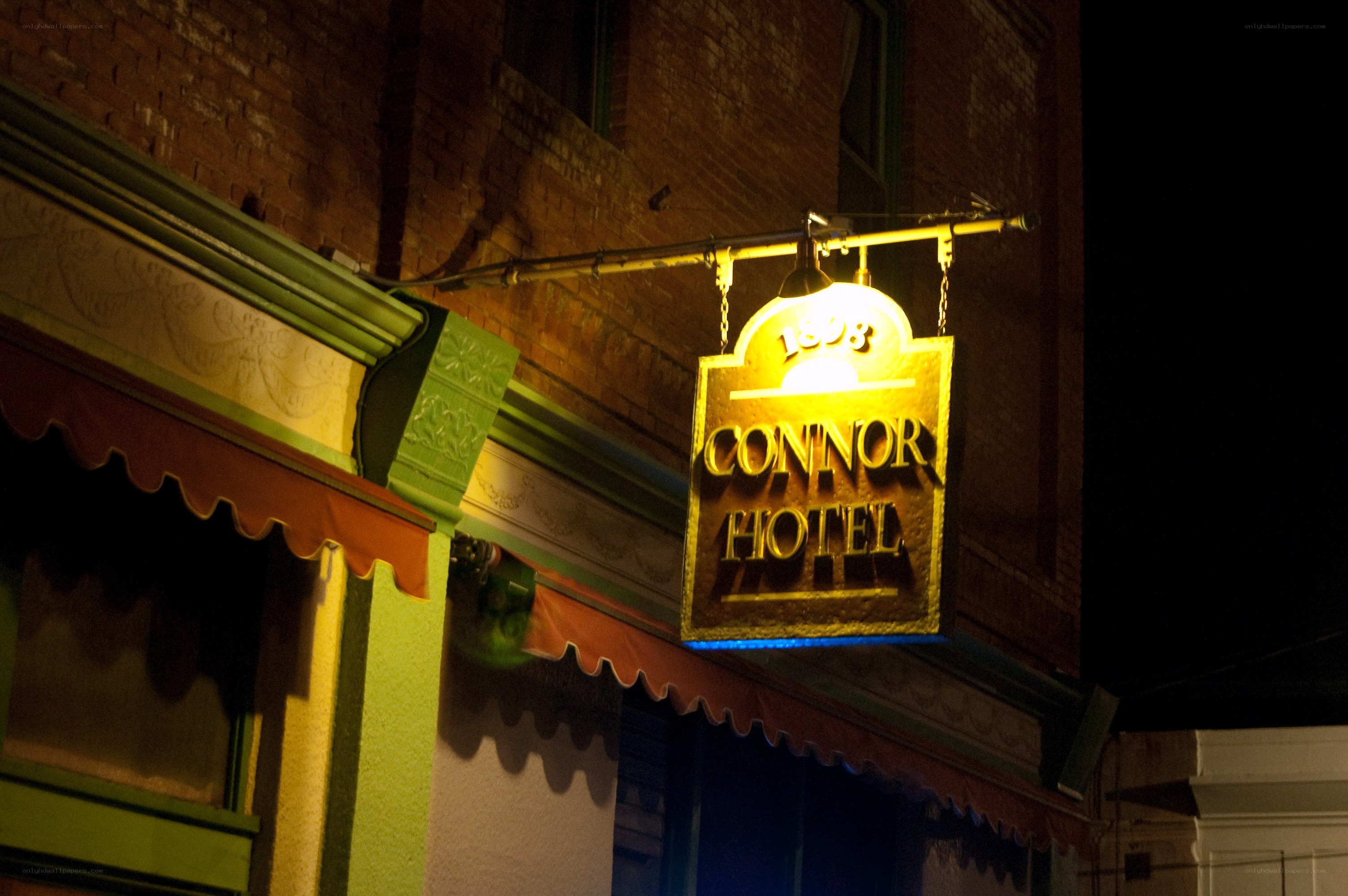 Connor Hotel sign at night