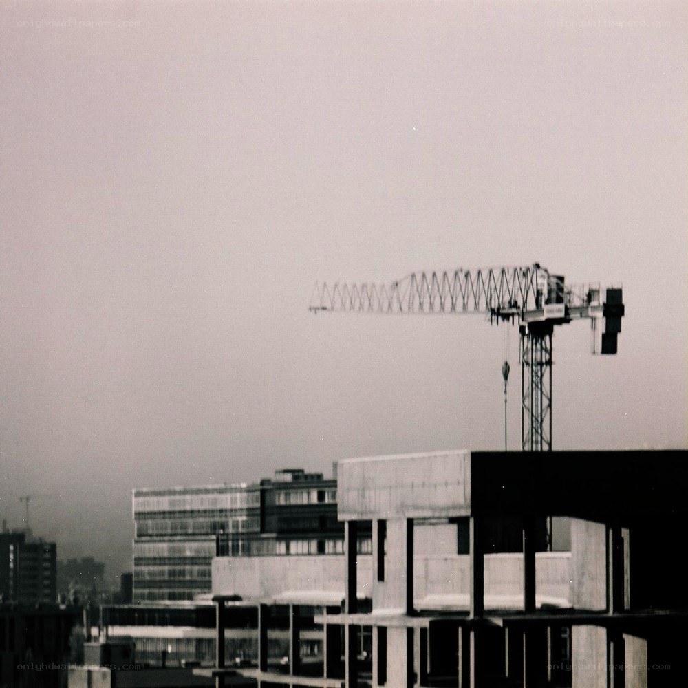 Construction crane over city