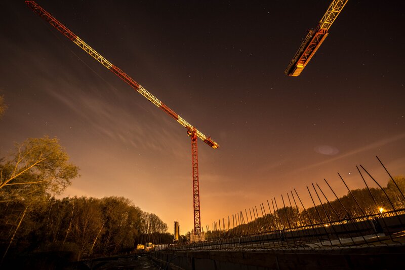 Construction Cranes at Night — Black