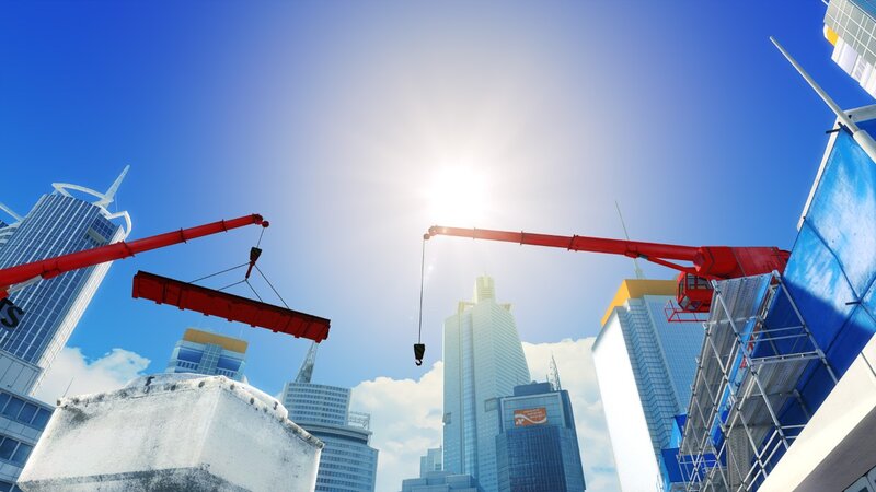Construction cranes in city