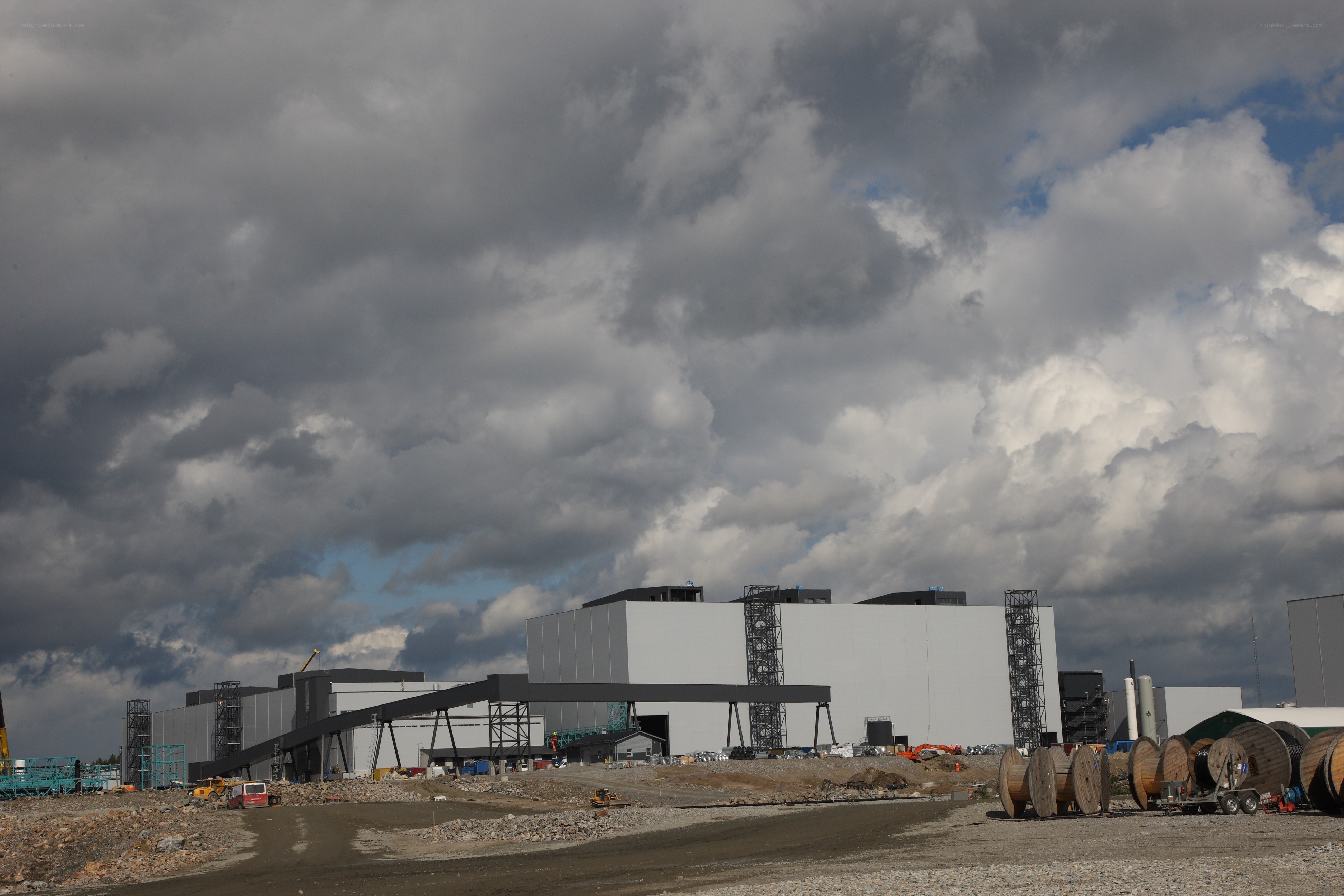 Construction site under cloudy sky