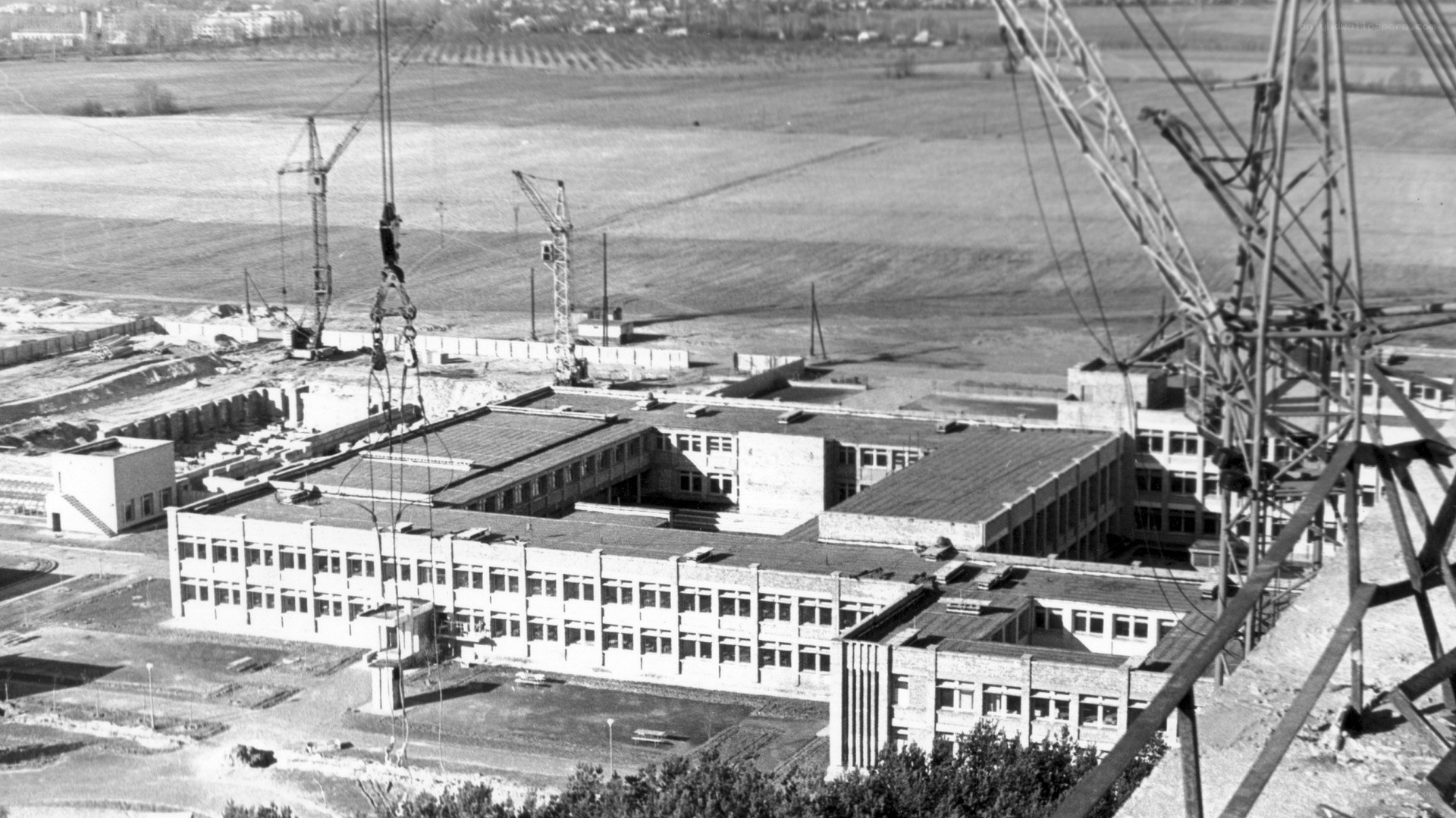 Construction site with cranes and buildings