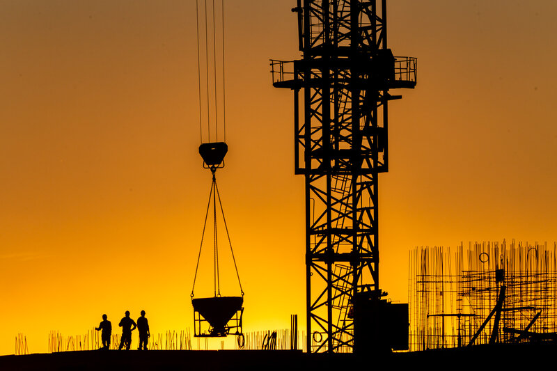 Construction Workers at Sunset — Orange