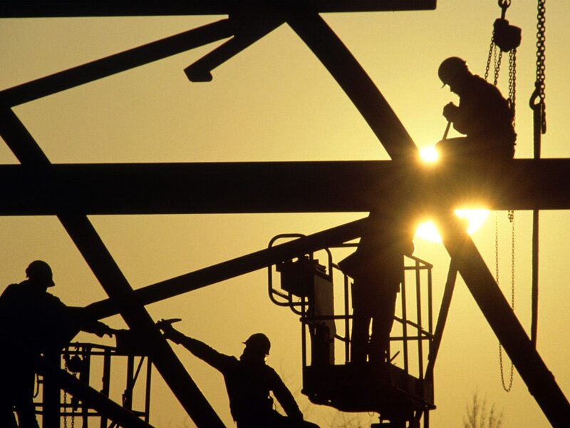 Construction Workers at Sunset
