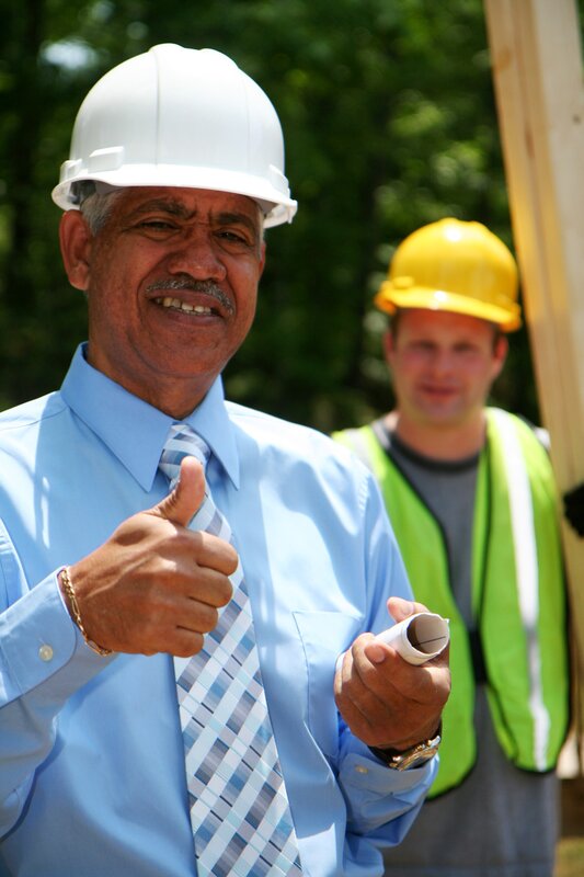 Construction workers giving thumbs up