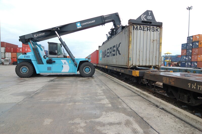 Container being loaded onto train